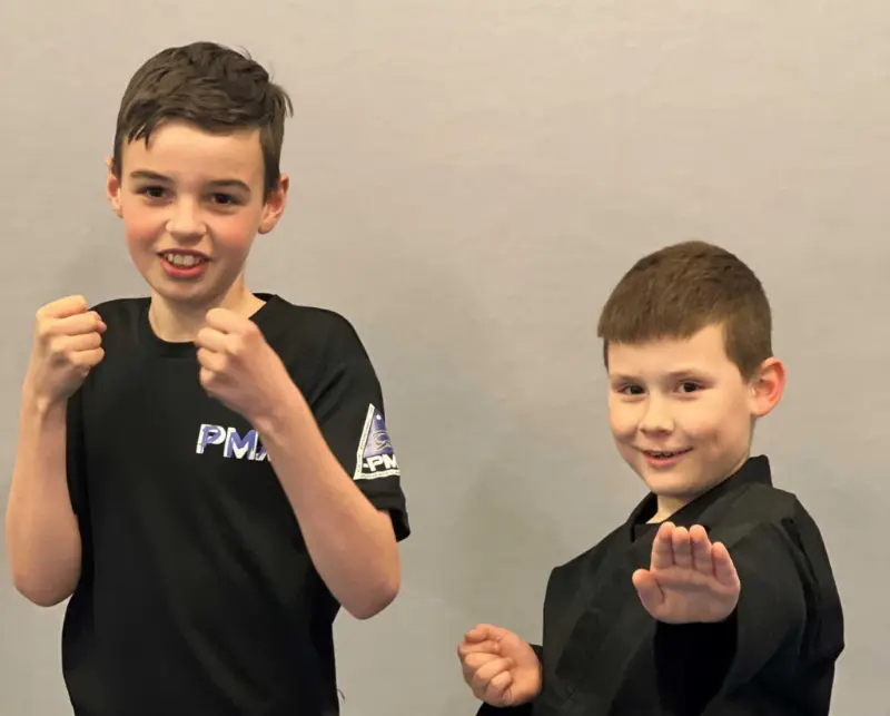 Instructor coaching a martial arts class in Llanfairfechan