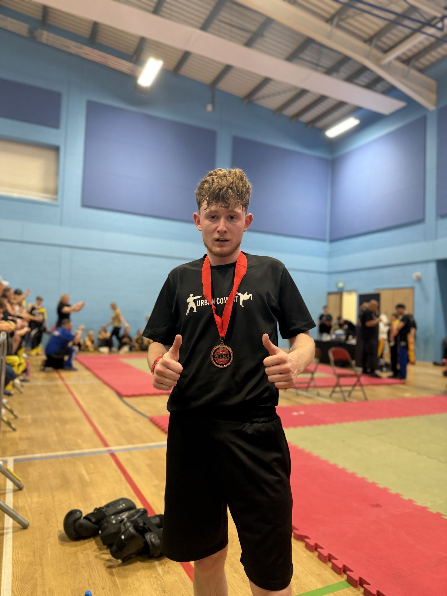 Jordan Owen with his medal at the WTKA British Open, Chesterfield